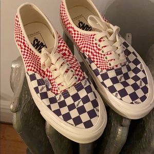 Red and purple checkered Vans.